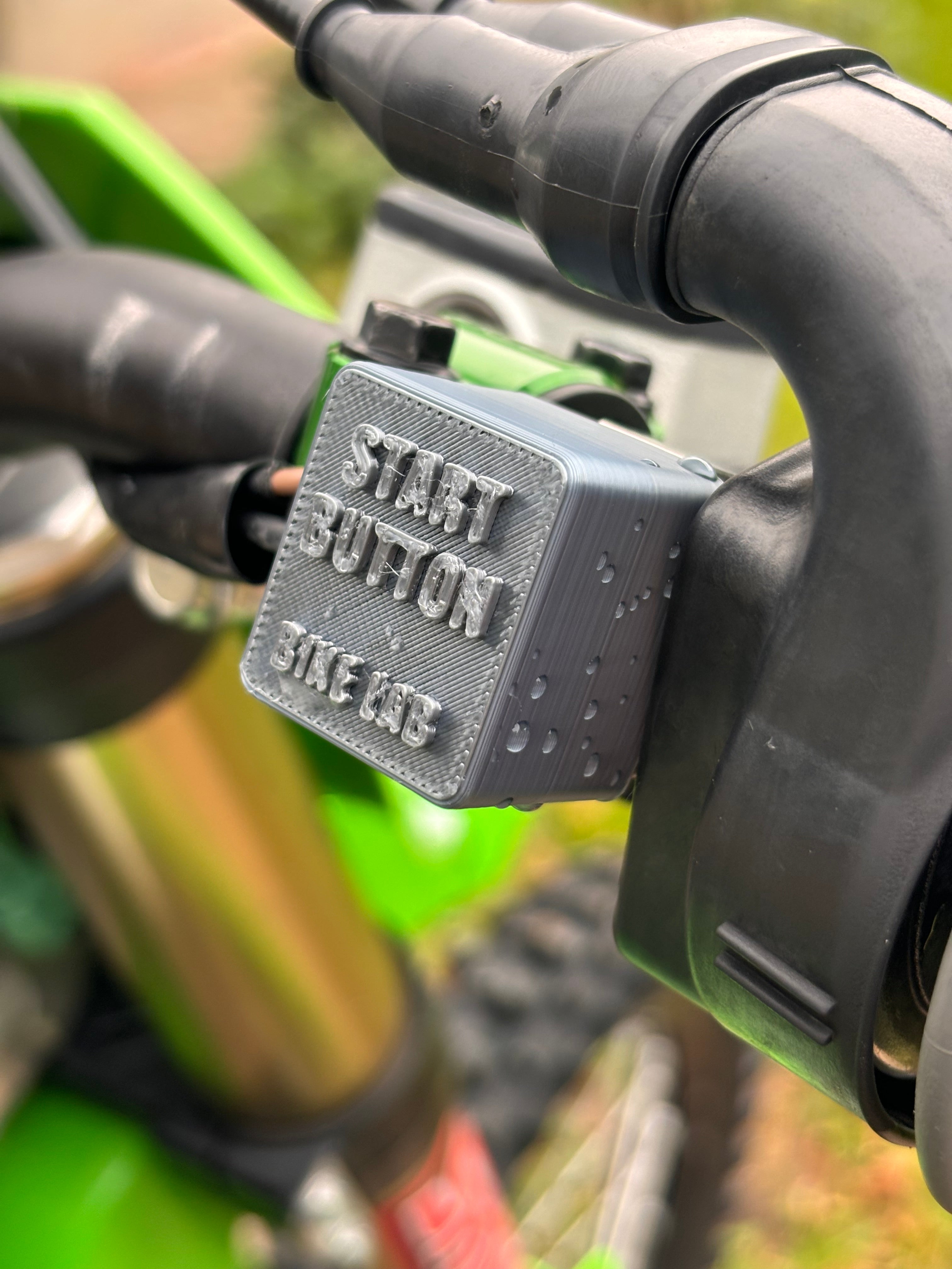 Protection de bouton MAP+START KXF